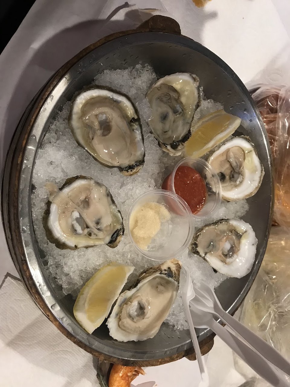 Printed seafood menu with fried and boiled dishes.