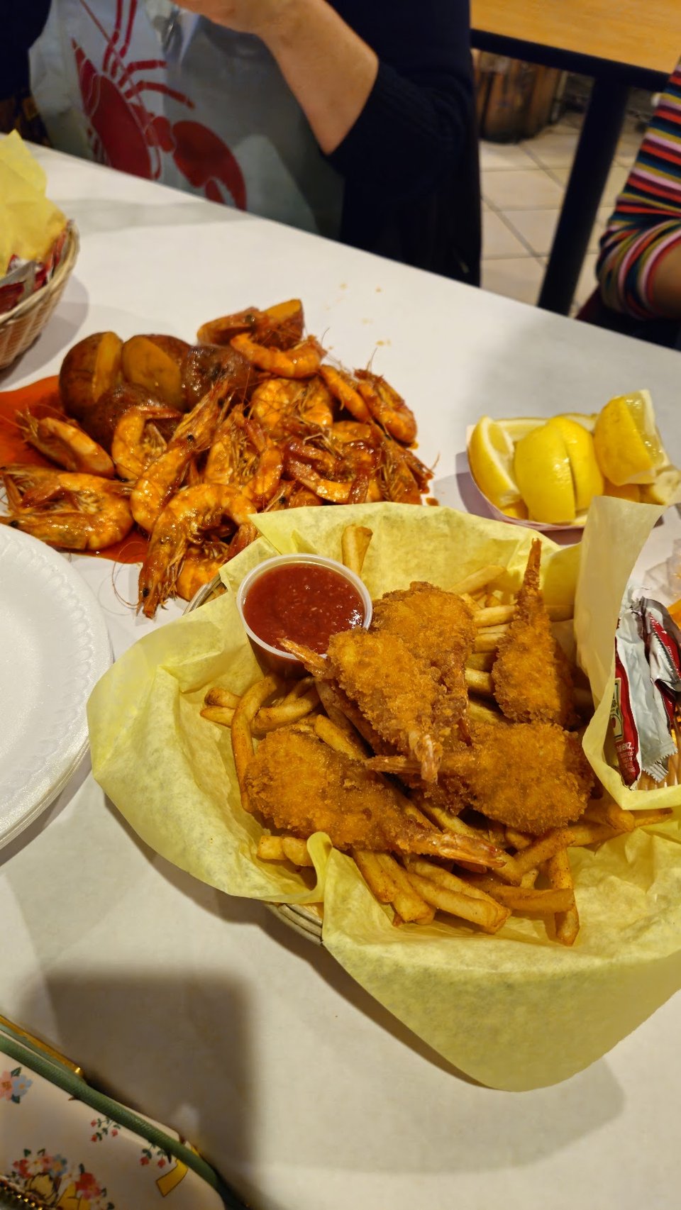 Printed seafood menu with fried and boiled dishes.