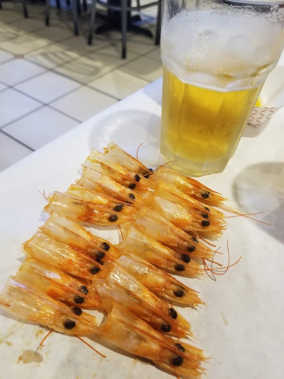 Restaurant menu featuring shrimp, crab, and fish.